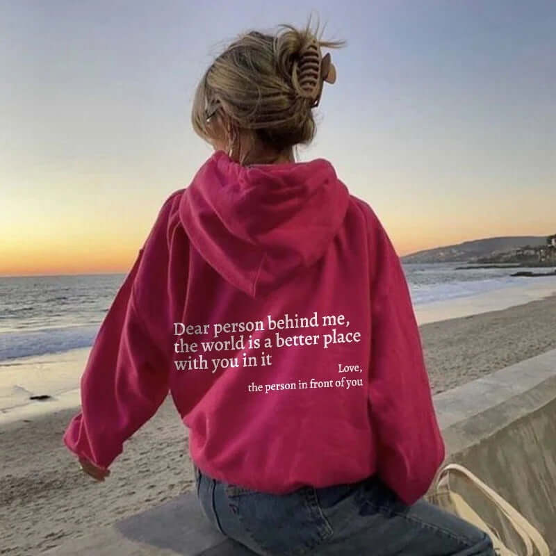 Dear Person Behind Me the World Is A Better Place with You pullover hoodie in pink by shop.name.